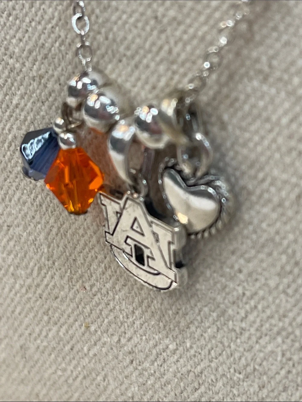 Auburn collegiate silver necklace with AU pendant in blue and orange
